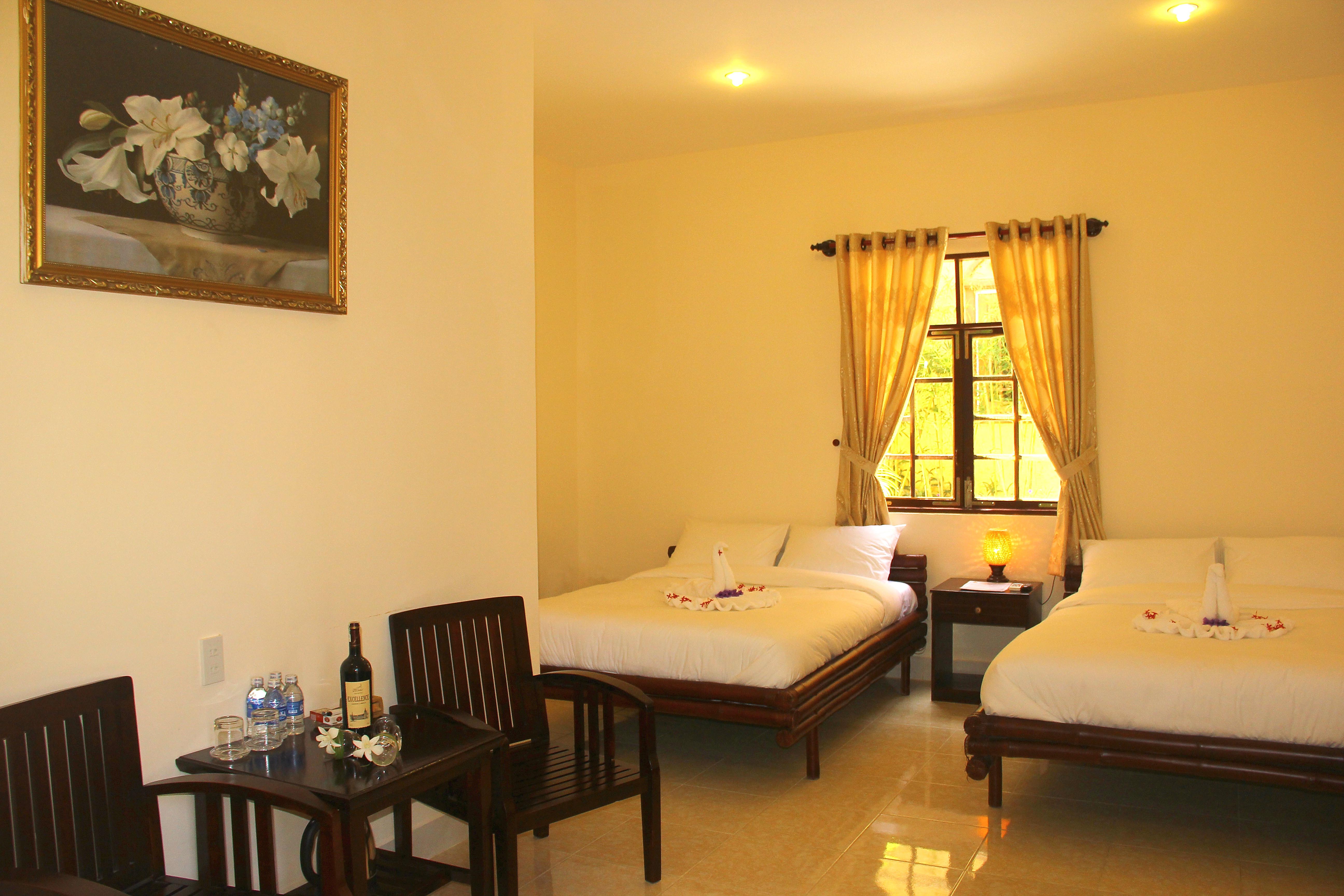 resort-nang-hon-rom-phong-deluxe-4-khach-2-hotel24h.net.jpg